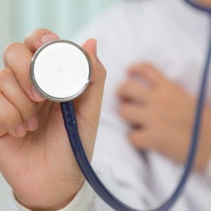 Doctor with stethoscope in the hands