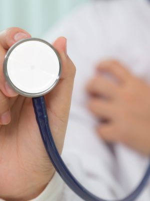 Doctor with stethoscope in the hands